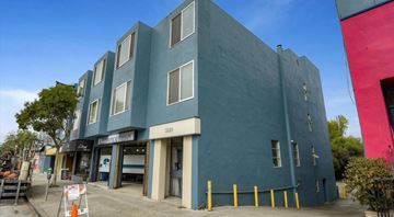 San Francisco apartment for rent - A blue building with a sign that says "2020" on it.