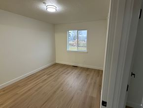 Benton City apartment for rent - A room with a window and wooden flooring.