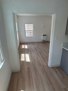 Los Angeles apartment for rent - A room with a window and a wood floor.