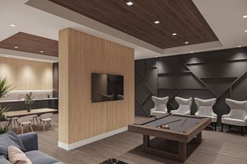 Ottawa apartment for rent - A modern living room with a pool table and a television.