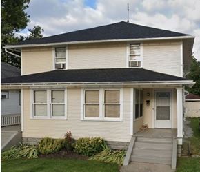 Lima apartment for rent - A house with a white front door and a small porch.
