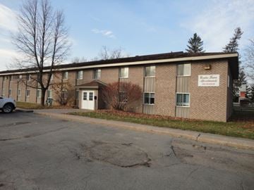 Pembroke apartment for rent - A building with a sign that says "Bellevue Assisted Living".
