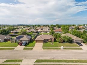 Killeen house for rent - A suburban neighborhood with houses and driveways.