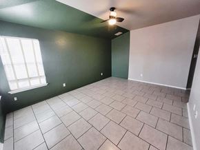 Killeen house for rent - A room with a window and a tiled floor.