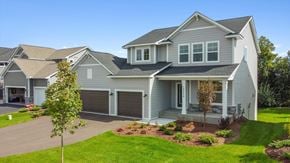 Blaine house for rent - A large, two-story house with a garage and a driveway.