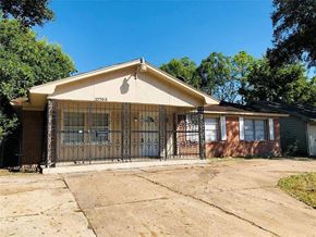 Houston house for rent - A house with the number 11703 on the front.