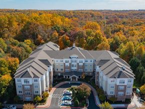 Germantown apartment for rent - A large apartment complex surrounded by trees in autumn.