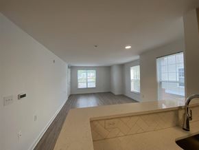 Olney apartment for rent - A kitchen area with a sink and a window.