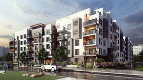 Edmonton apartment for rent - A modern apartment building with balconies and multiple stories.