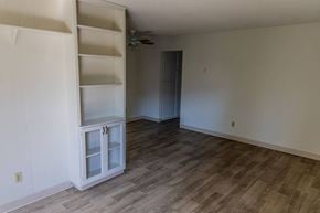 San Diego apartment for rent - A room with a cabinet and a fan.