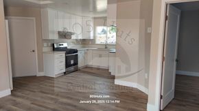Santa Maria apartment for rent - A kitchen with a stove top oven and a microwave.