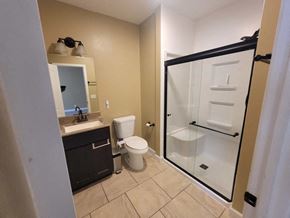 Lebanon house for rent - A bathroom with a toilet, sink, and shower.