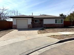 San Diego house for rent - A house with a garage and a driveway in front.