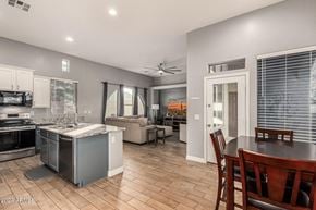 Buckeye house for rent - A kitchen with a dining table and chairs.