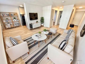 Denver apartment for rent - A brick building with a sign that says Melody Arts.