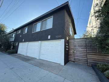 Long Beach apartment for rent - A black house with the number 1020 on it.