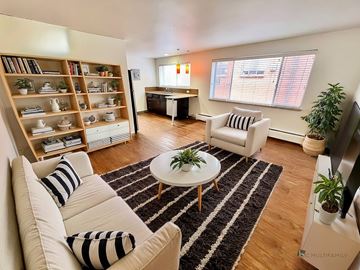 Denver apartment for rent - A red brick building with the number 63 on it.