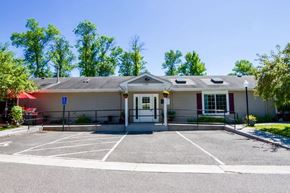 White Bear Lake apartment for rent - A building with a parking lot in front of it.