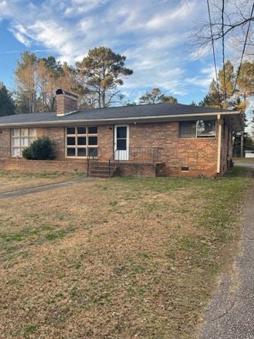 Cedartown apartment for rent - A small brick house with a white door and a small porch.