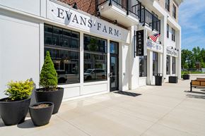 Lewis Center apartment for rent - A white building with Evans Farm written on it.