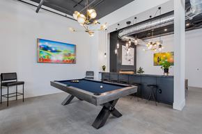 Lewis Center apartment for rent - A pool table in a room with a painting on the wall.