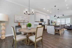 Lewis Center apartment for rent - A modern dining room with a round table and chairs.