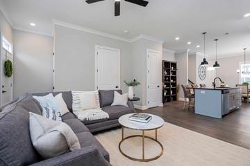 Lewis Center apartment for rent - A living room with a grey couch and a round coffee table.