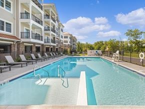 Basking Ridge apartment for rent - A large swimming pool in front of apartment buildings.