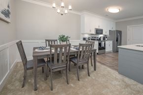 Columbus apartment for rent - A dining room with a table set for six.