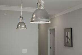 Columbus apartment for rent - A silver pendant light hangs over a white door.