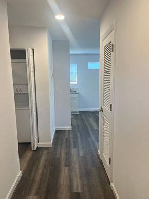 St. Augustine apartment for rent - A hallway with a white door and a white wall.
