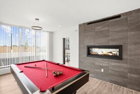 Lucan apartment for rent - A pool table with a red cloth and two pool balls on it.