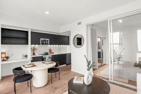Lucan apartment for rent - A modern kitchen with a dining table and chairs.