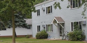 St Cloud apartment for rent - A house with a tree in front of it.