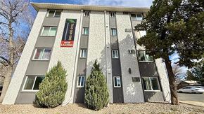 Aurora apartment for rent - A park with a swing set and a fence.