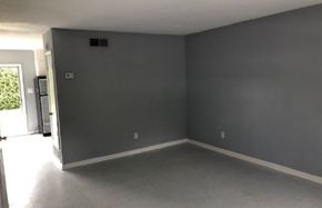 Monroe apartment for rent - A room with grey walls and a white door.
