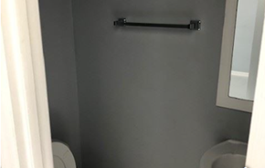 Monroe apartment for rent - A white toilet paper roll is on the wall.
