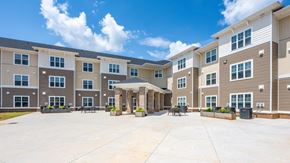 Statesville apartment for rent - A large apartment complex with a central courtyard and multiple buildings.