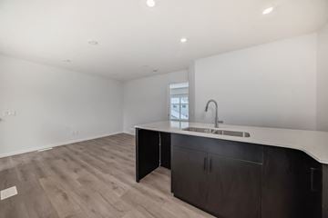 Edmonton apartment for rent - A kitchen with a sink and cabinets.