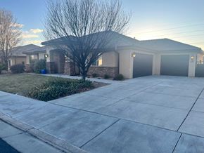 Washington house for rent - A house with a driveway and garage doors.