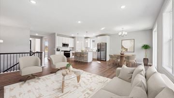 Blaine house for rent - A modern living room with a white sofa set and a patterned rug.