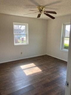 Round Rock house for rent - A room with a ceiling fan and a window.