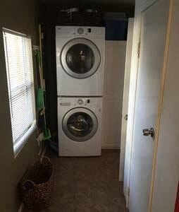 Santa Barbara house for rent - A white dryer and washer in a small laundry room.