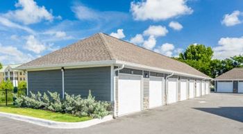 A row of garage doors are closed.