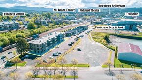 Bellingham apartment for rent - A bird's eye view of a downtown area with Elizabeth Station, Mt. Baker Theater, Pickford Theater, Downtown Bellingham, Ponderosa Beer & Books, and Trackside labeled.