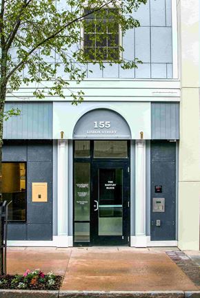 Lewiston apartment for rent - The front of a building with the number 155 on it.