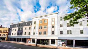 Lewiston apartment for rent - A street view of a building with a sign that says