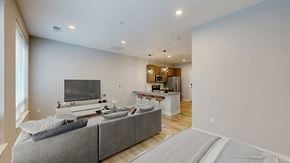 Columbus apartment for rent - A modern kitchen with a dining table and chairs.