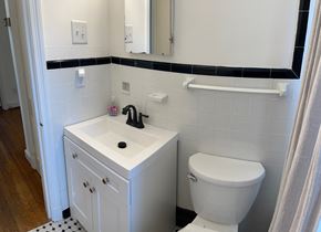 Fuquay-Varina house for rent - A white sink and toilet in a bathroom.