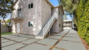 Van Nuys apartment for rent - A two-story building with a balcony on the second floor.